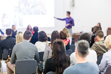 Image showing Audience in lecture hall participating at business conference.