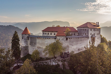 Image showing Medieval castle on Bled lake in Slovenia in autumn.