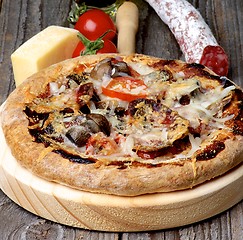 Image showing Pizza with Edible Mushrooms and Salami