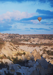 Image showing Hot air balloon flying over the rocks of Cappadocia