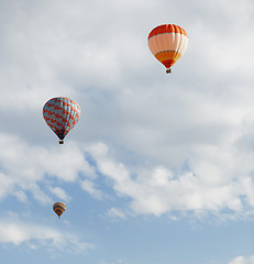 Image showing Three air balloons flying in the sky