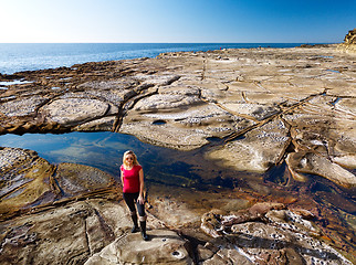 Image showing Standing in a cratered landscape