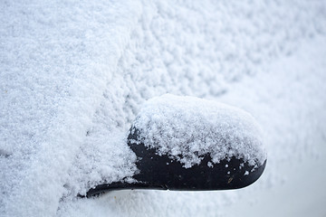 Image showing Everything covered in snow even the cars