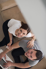 Image showing happy young couple buying online