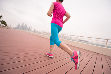 Image showing woman running on the promenade