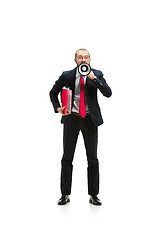 Image showing Front view of a man screaming on the megaphone over white background