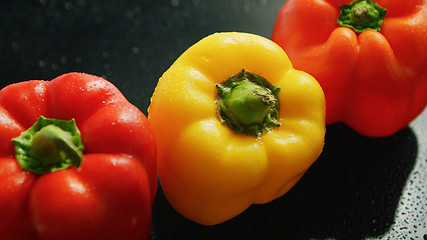 Image showing Ripe red and yellow peppers