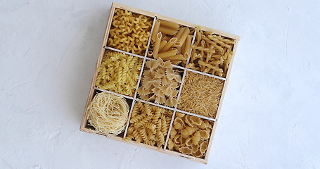 Image showing Container with macaroni of different shape