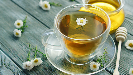 Image showing Closeup of cup with camomile tea