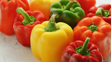Image showing Multicolored bell peppers in heap