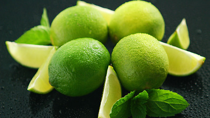 Image showing Ripe green limes on table 