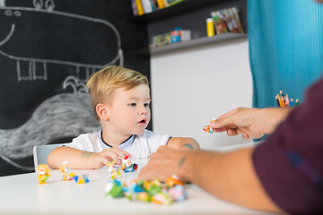 Image showing Cute little toddler boy at child therapy session.