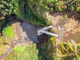 Image showing Aerial top view perspective of Chamarel Waterfall in the tropical island jungle of Mauritius.