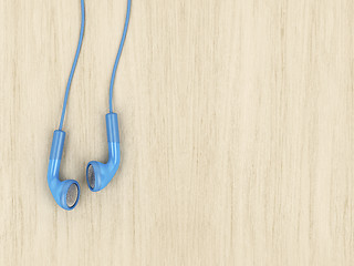 Image showing Blue wired earphones, top view