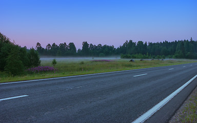 Image showing Empty Straight Asphalt Road In A Misty Morning Twilight