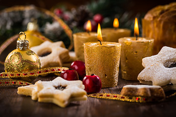 Image showing Christmas candles with homemade cookies 