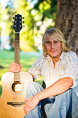 Image showing Caucasian guitar player