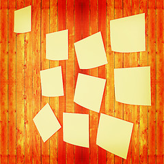 Image showing Mock-up of Sticky note paper on a wooden wall. 3D illustration. 