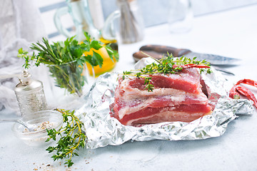 Image showing raw meat in foil