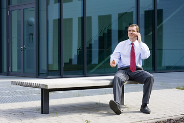 Image showing Businessman with mobile phone