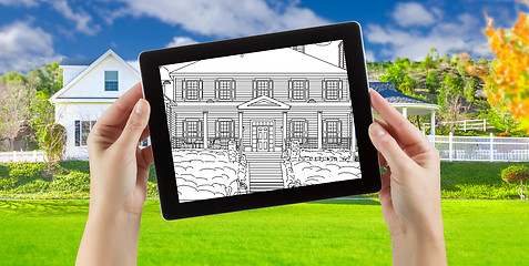 Image showing Female Hands Holding Computer Tablet with House Drawing on Scree