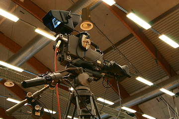 Image showing Tv camera in a large hall.