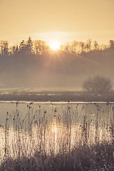 Image showing Lake scenery in the morning sunshine with mist