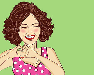 Image showing Pop art woman making heart sign with hands. Comic woman . Pin up