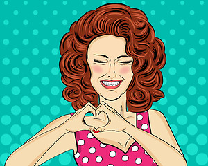 Image showing Pop art woman making heart sign with hands. Comic woman . Pin up