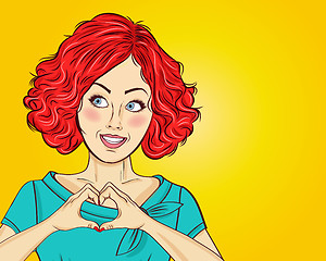 Image showing Pop art woman making heart sign with hands. Comic woman . Pin up