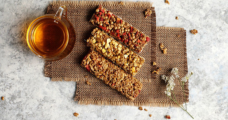 Image showing Cereal bars with herb tea