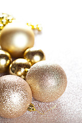 Image showing Christmas golden glitterdecorations.