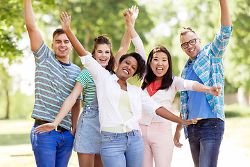 Image showing group of happy smiling friends having fun outdoors