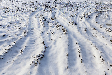 Image showing traces of the car on snow