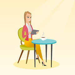 Image showing Woman surfing in the social network in the cafe.