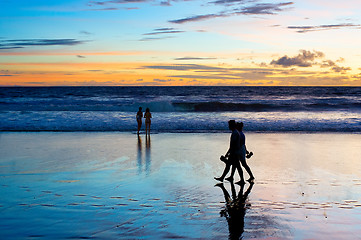 Image showing Romantic couple walk  beach Bali