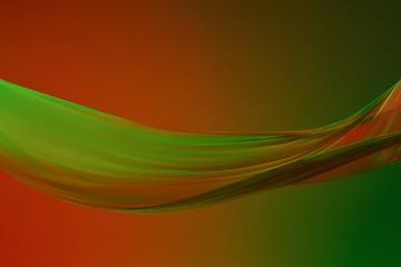Image showing Smooth elegant transparent green cloth on green colored background.
