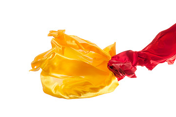 Image showing Smooth elegant transparent yellow, red, cloth separated on white background.