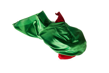Image showing Smooth elegant transparent red, green cloth separated on white background.