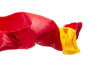 Image showing Smooth elegant transparent yellow, red, cloth separated on white background.