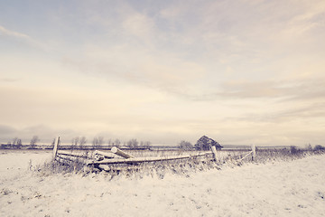 Image showing Winter scenery with a wooden fence