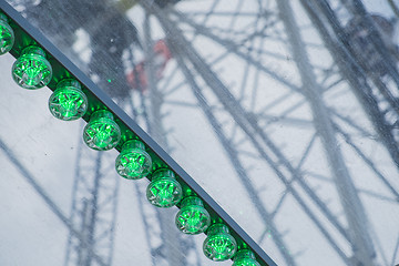 Image showing Green lights of a big wheel