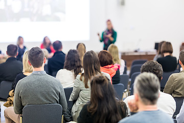 Image showing Woman giving presentation on business conference workshop.