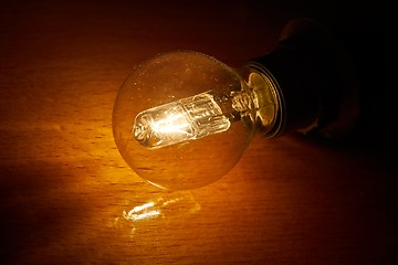 Image showing Light bulb on a table