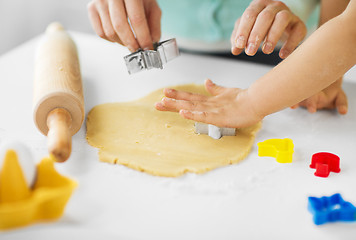 Image showing mother and daughter making cookies at home