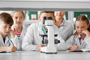 Image showing kids or students with microscope biology at school