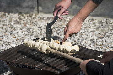 Image showing Homemade dough over a grill