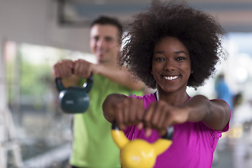 Image showing couple  workout with weights at  crossfit gym