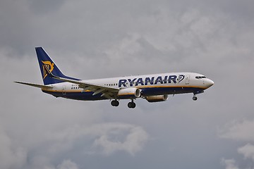 Image showing Plane landing in cloudy weather