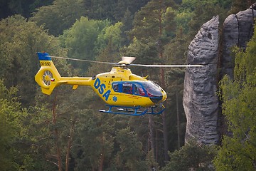 Image showing Rescue helicopter in the mountains